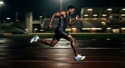 A professional side-profile shot of the Mizuno Wave Rebellion Pro 4 in a high-speed motion blur, set against a dark, moody stadium track.