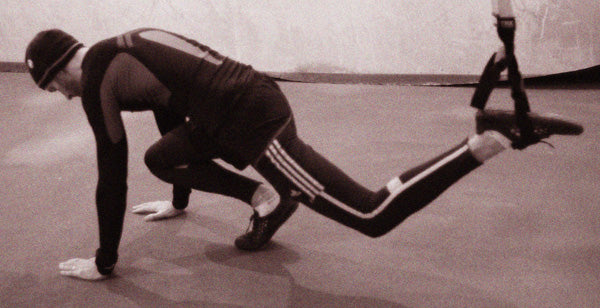 TRX single leg burpee start position