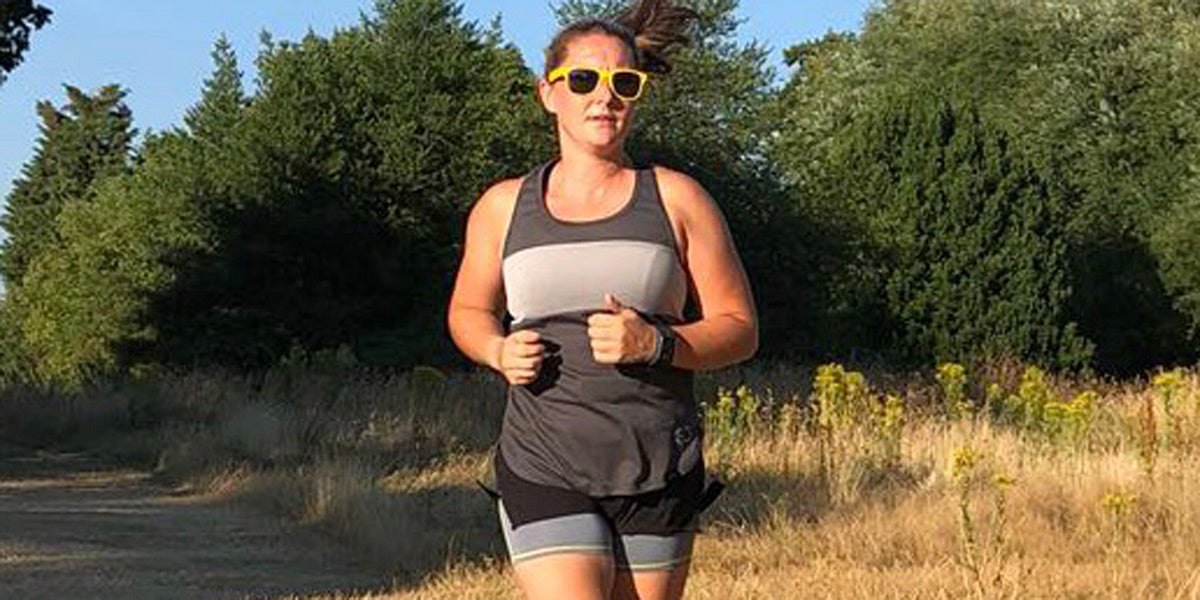 personal trainer running Sundried activewear