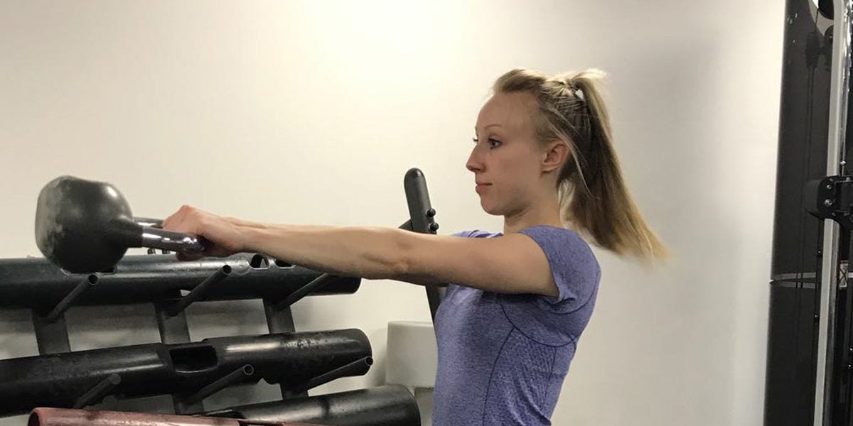personal trainer kettlebell swings