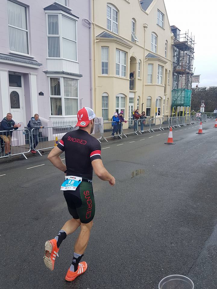 Matt Leeman running Tenby Wales Ironman triathlon pro athlete