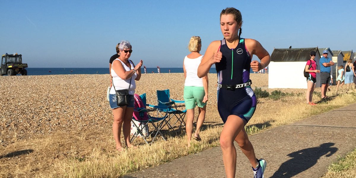 running athlete beach triathlon