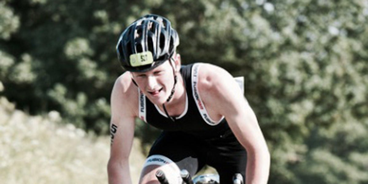 triathlete cycling bike riding triathlon racing