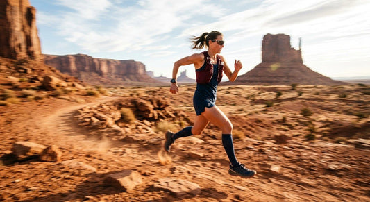 A professional ultra-trail runner sprinting across a sun-drenched desert trail with dramatic motion blur and high-contrast lighting.
