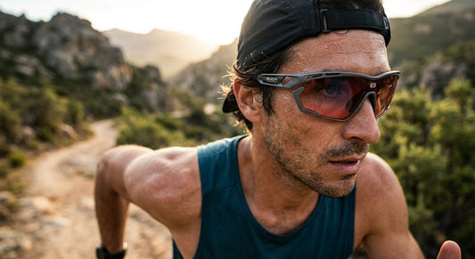 Close-up of a runner wearing Rudy Project Propulse sunglasses with sharp detail on the frame geometry and lens texture