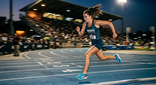 A professional action shot of a runner wearing Hoka shoes sprinting on a track, captured with high-speed motion blur and dramatic stadium lighting.