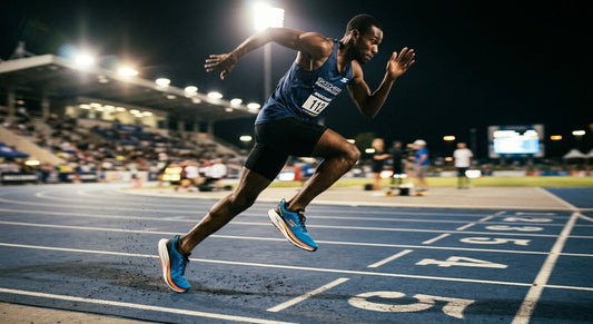 A professional action shot of the Skechers GoRun Speed Beast on a sleek synthetic track, capturing the motion blur of a fast runner under stadium lights.