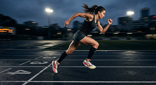 A side-profile shot of the Mizuno Wave Rebellion Pro 4 in a high-speed motion blur capture on a dark running track.