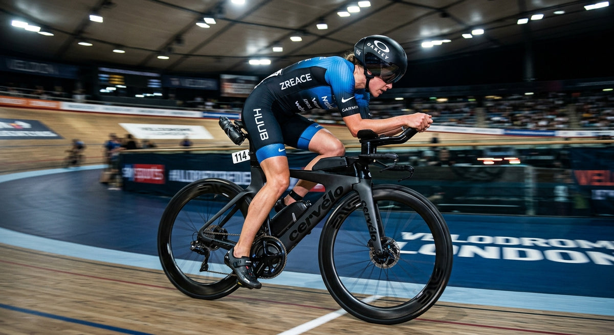 A professional triathlete in an aerodynamic tuck position on a carbon fibre bike, featuring a sleek, frame-integrated hydration system under stadium lights.