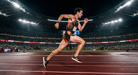 High-speed side profile of a professional runner wearing the Altra Escalante 5 on a synthetic track, featuring motion blur and dramatic stadium lighting.