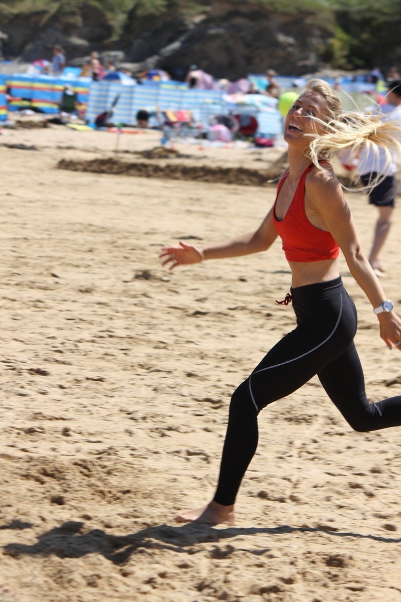 Running on the beach happy sunshine