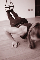 TRX Push Up to Shoulder Tap Bottom Position