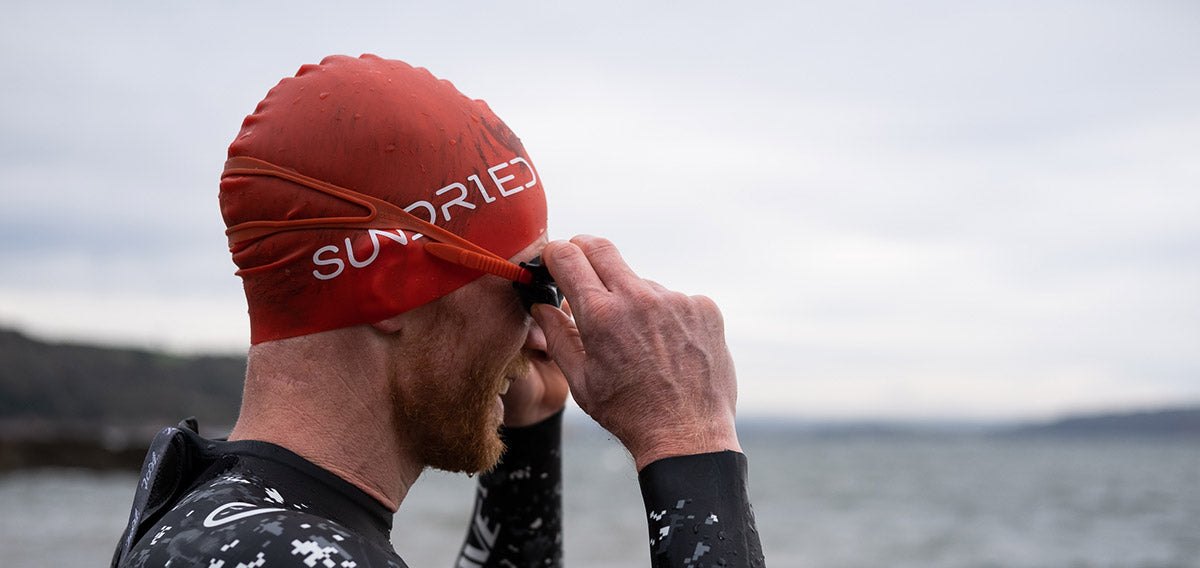 Triathlete enter the water for a triathlon