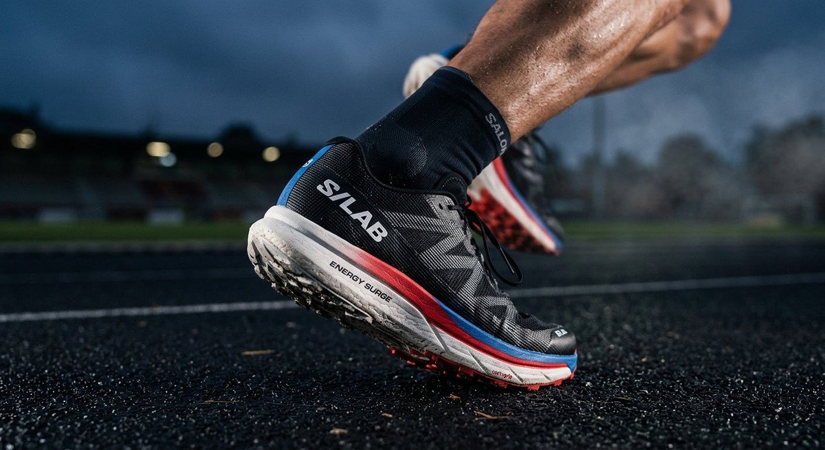 A close-up, macro-style photograph highlighting the technical mono-mesh texture and energy-return midsole of the Salomon S Lab Phantasm 3.