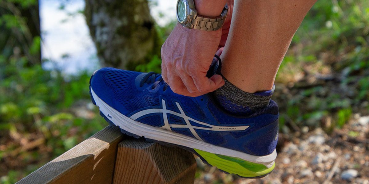 ASICS running shoes brand sportswear activewear fitness sports