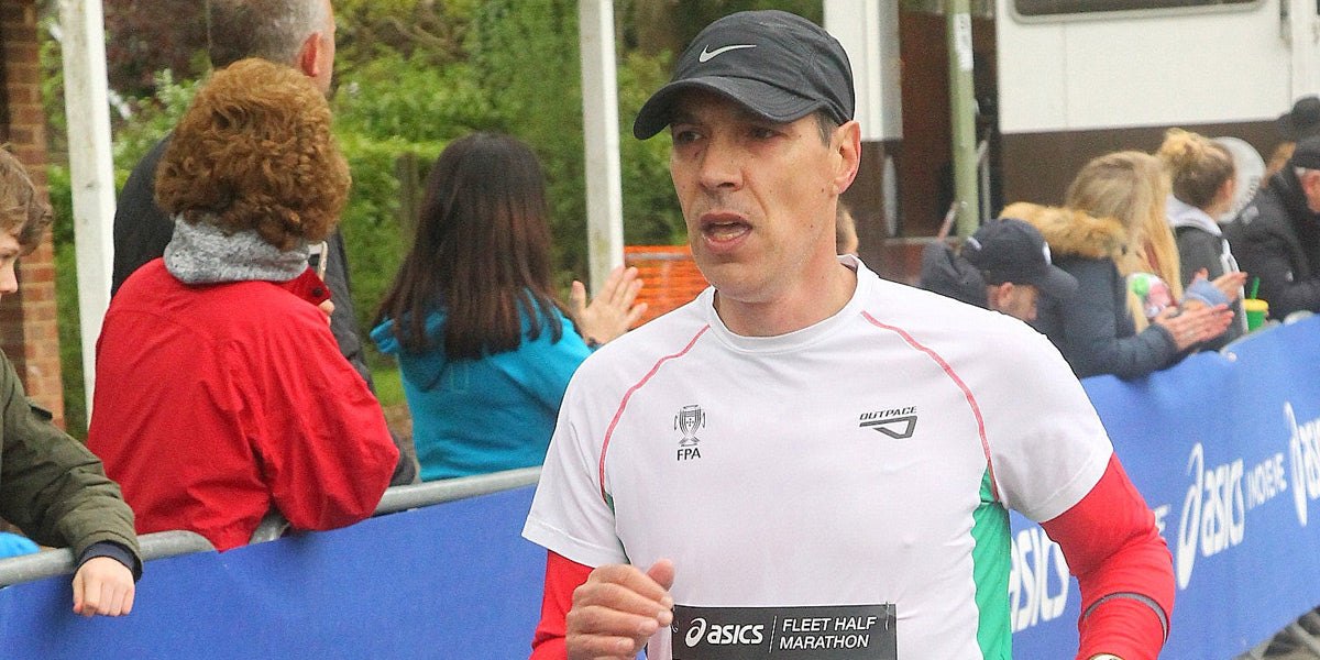 athlete running sprint finish triathlon