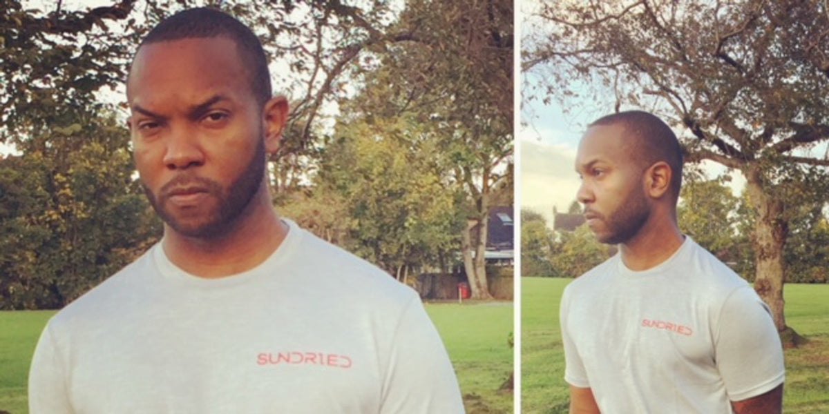 athlete stretching London park