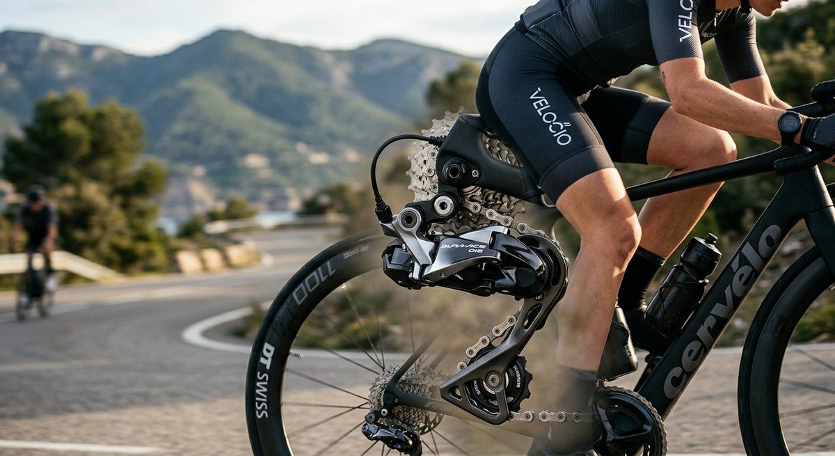 Close-up of a modern electronic bicycle groupset derailleur with sharp focus and metallic textures