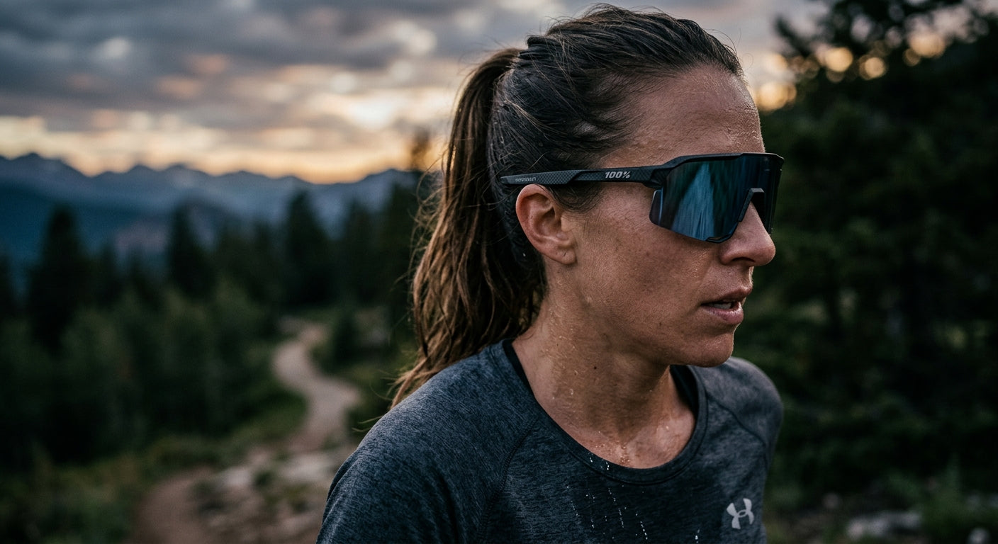 Close-up of the 100% Hypercraft rimless carbon-infused frame showing fine texture and sleek design against a moody, blurred background.