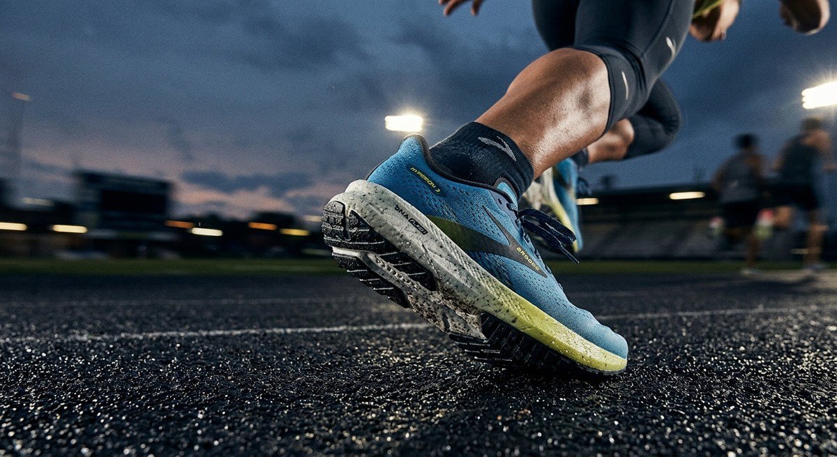Close-up of the Brooks Hyperion 3 midsole texture during a high-intensity interval sprint.