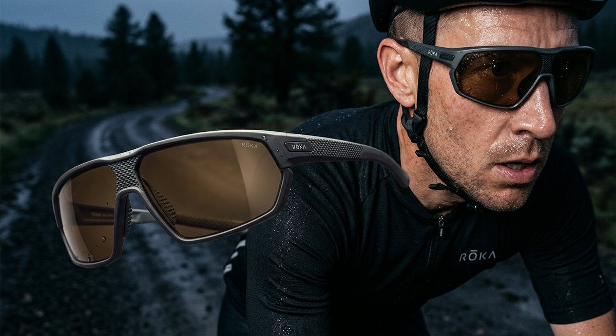 Close-up of the ROKA San Remo AIR frame showing the intricate textured grip and aerodynamic lens geometry in moody lighting.
