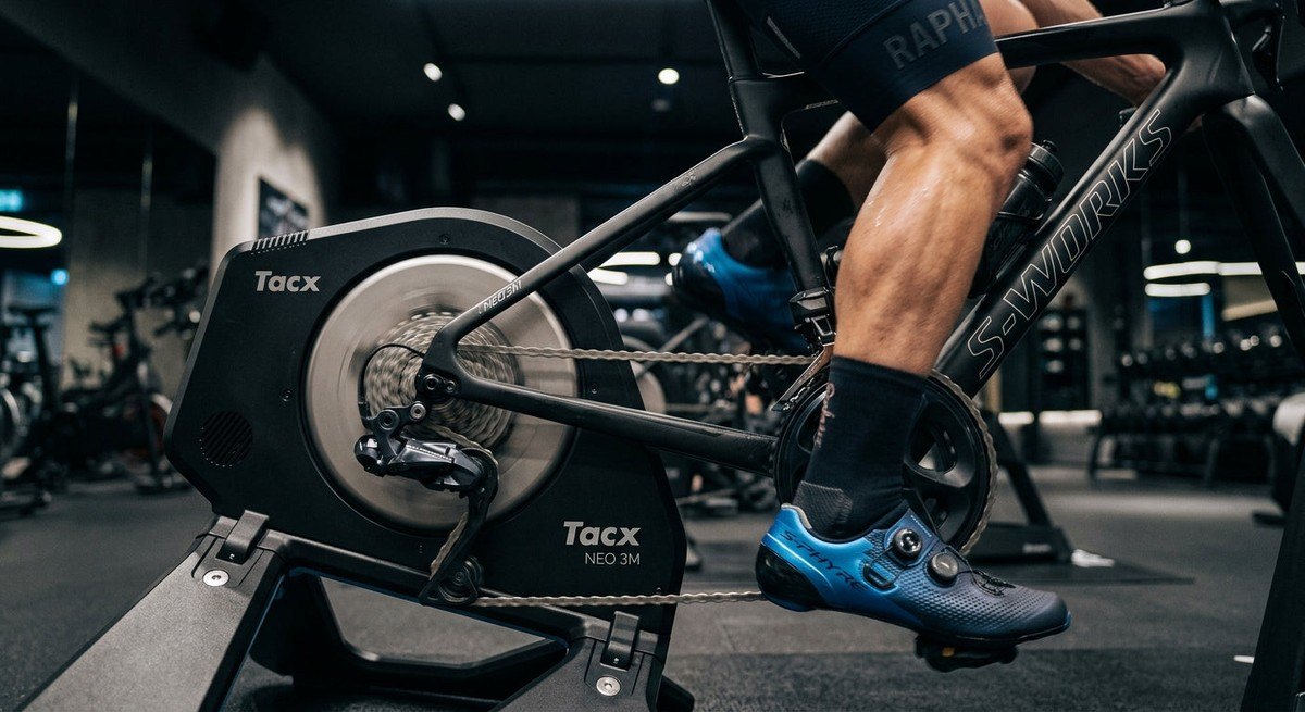 Close-up of the Tacx Neo 3M drivetrain showing refined engineering and textures in high-speed photography.