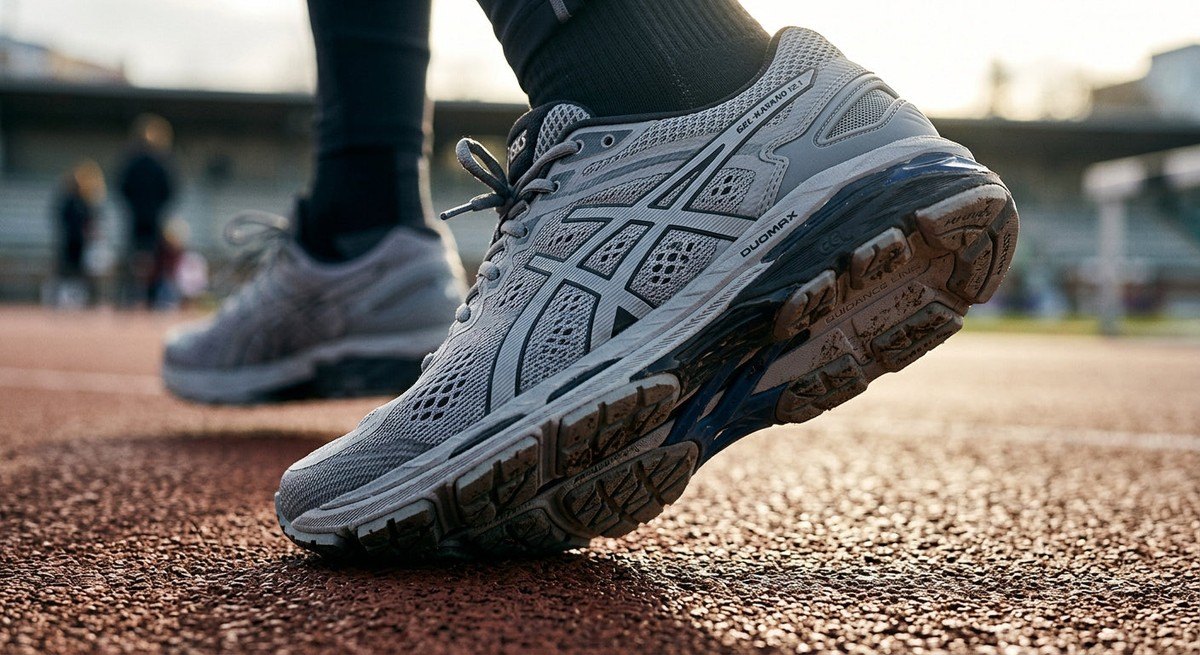 Close-up of the technical mesh and high-performance outsole of the ASICS Gel-Kayano 12.1, showing intricate material textures.