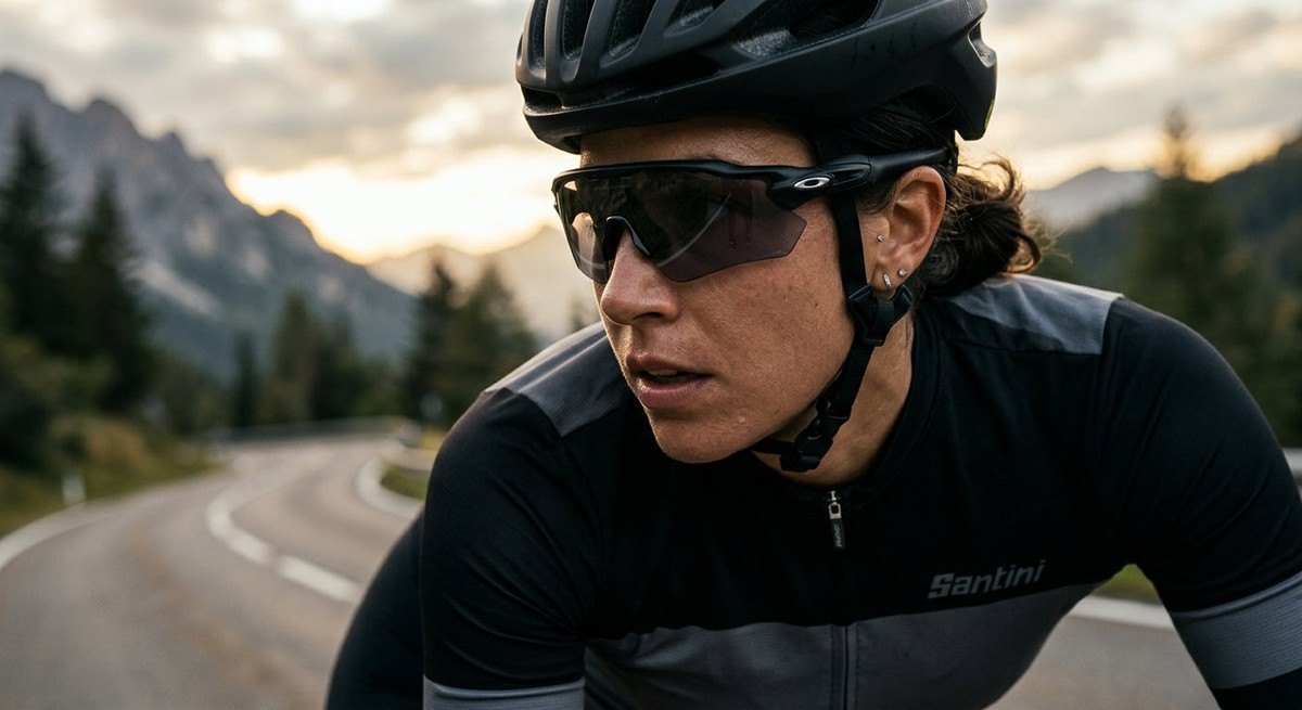 Close-up shot of a pair of high-end cycling sunglasses featuring photochromic lenses, captured with sharp focus and realistic textures.
