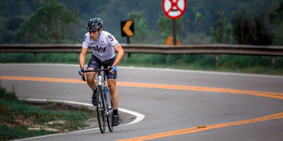 cyclist biking uphill 