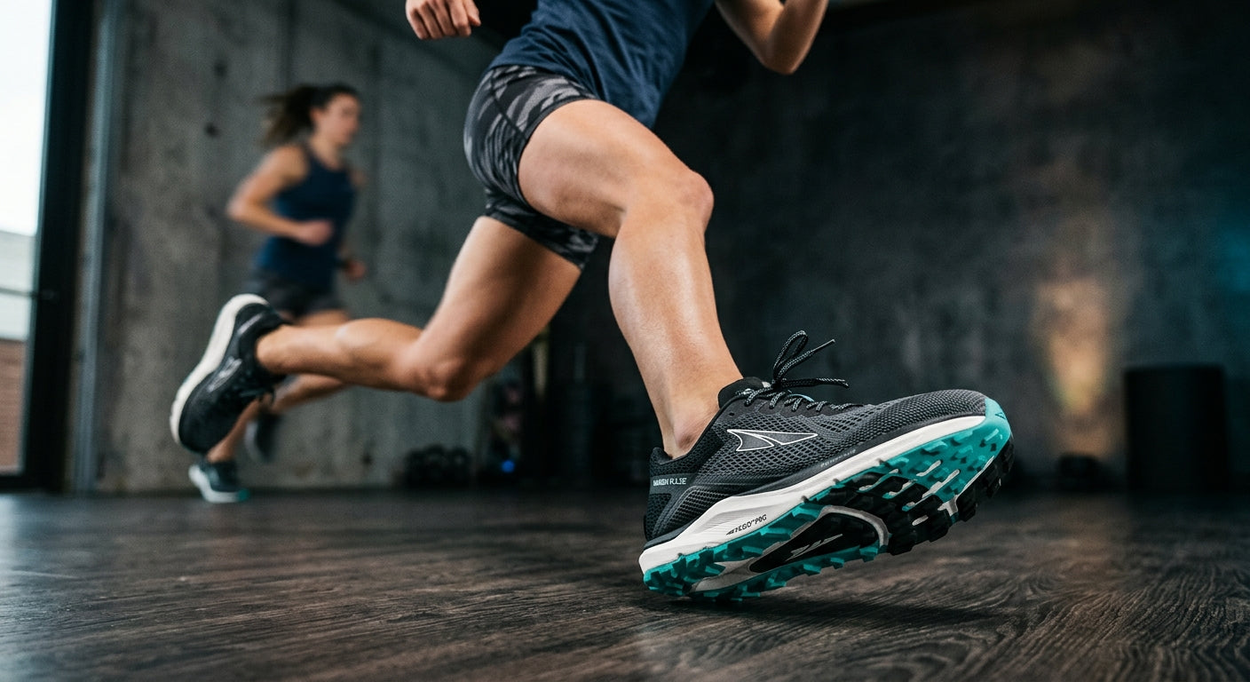 Detailed studio photography of the Altra Vanish Pulse showing the engineered mesh upper and the aggressive rocker geometry of the outsole.