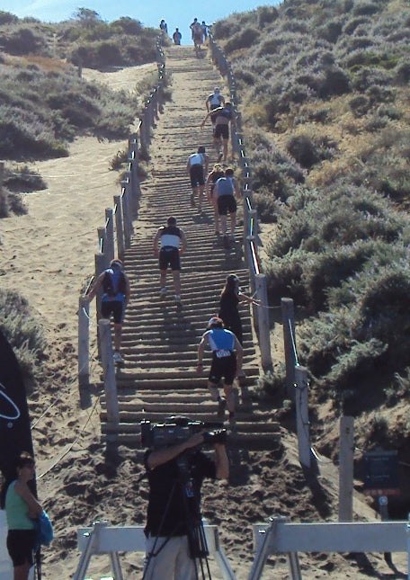 Escape From Alcatraz run climb stairs sand beach