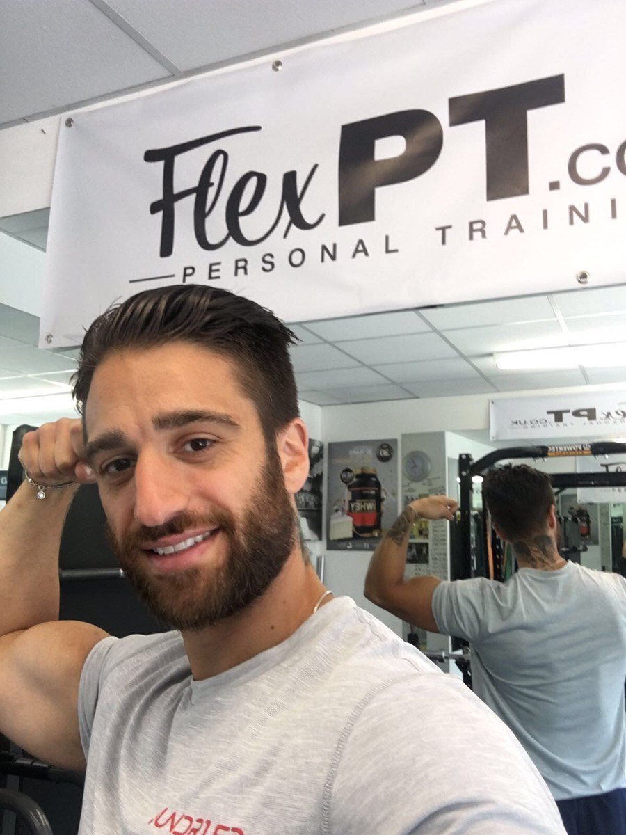 Flex Personal Trainer Bicep Strong Gym Smiling