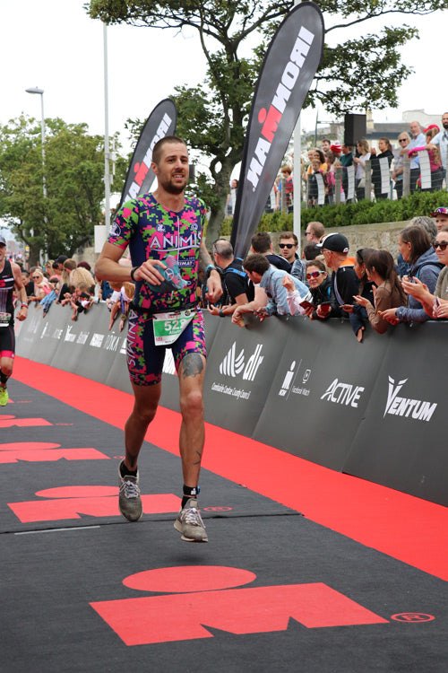 running Ironman finish line