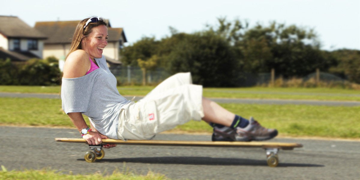 Katrina Beddoe Pro Surfer Skateboaring Smiling
