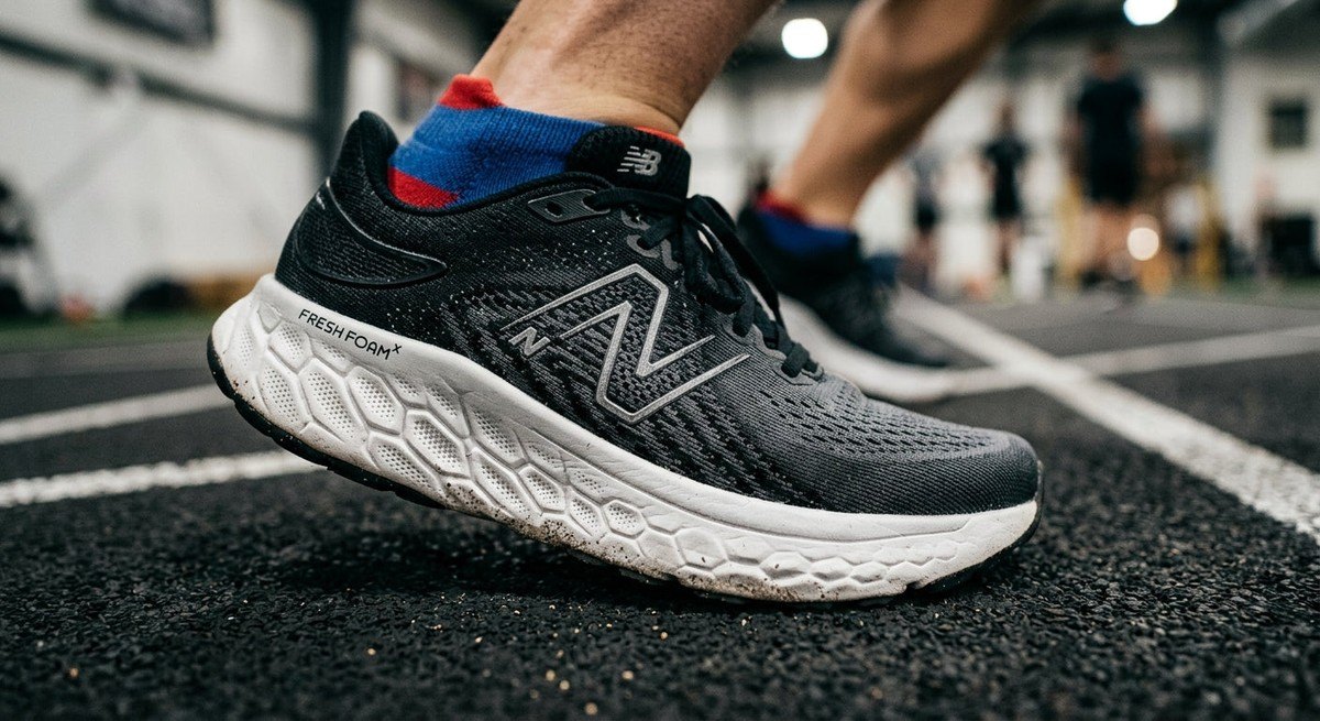 Macro close-up detail of the engineered mesh upper and Fresh Foam X midsole texture on a high-performance New Balance running shoe.