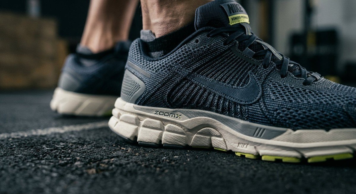 Macro detail of the engineered mesh upper and ZoomX midsole geometry of the Nike Vomero Premium, highlighting texture and material precision.