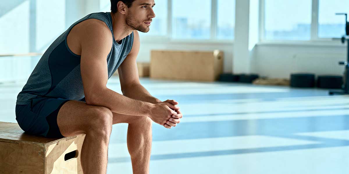 An athleter resting preparing for training. Willpower Tips