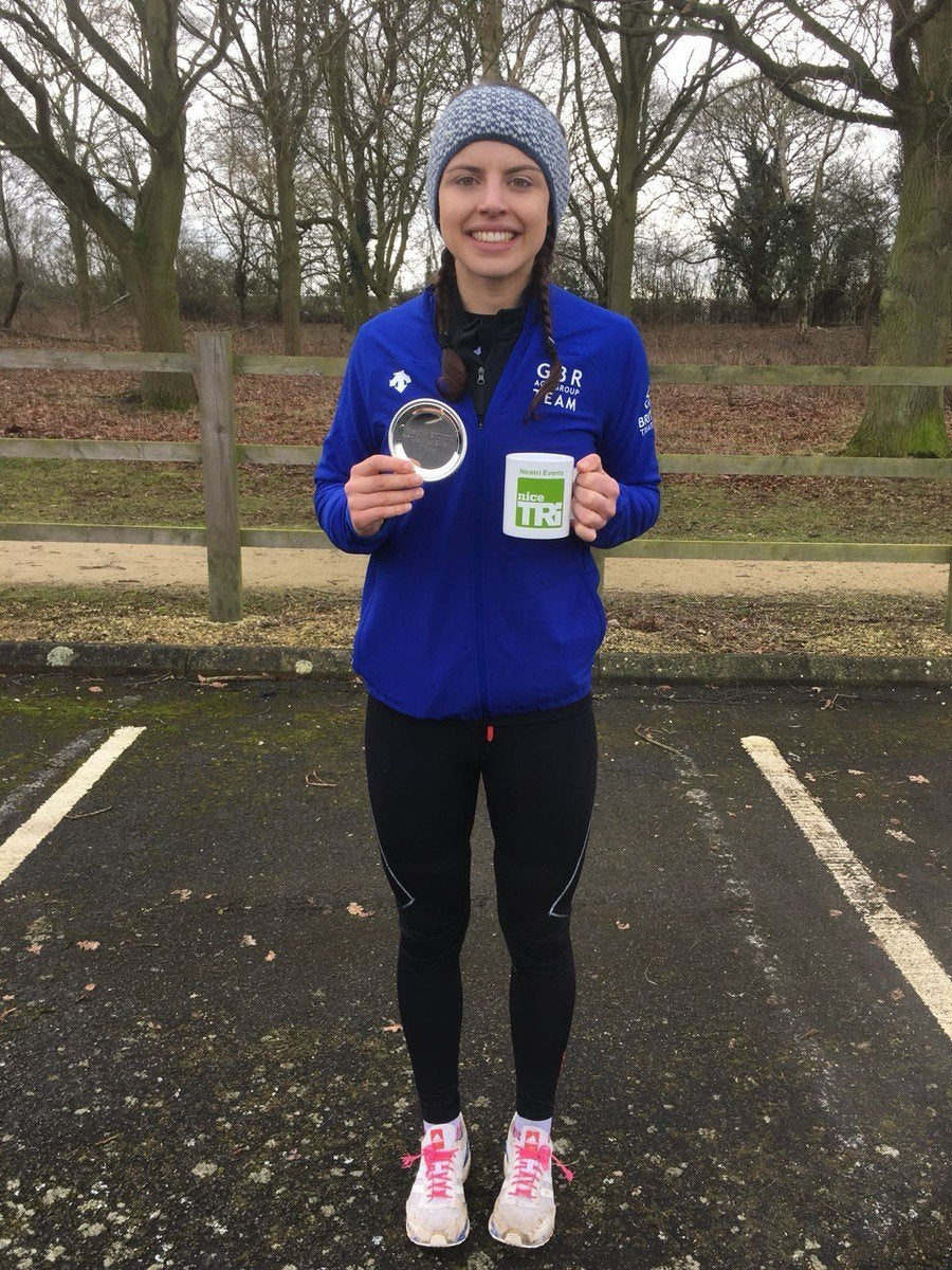 Megan Powell GB Age Group Triathlete running winner