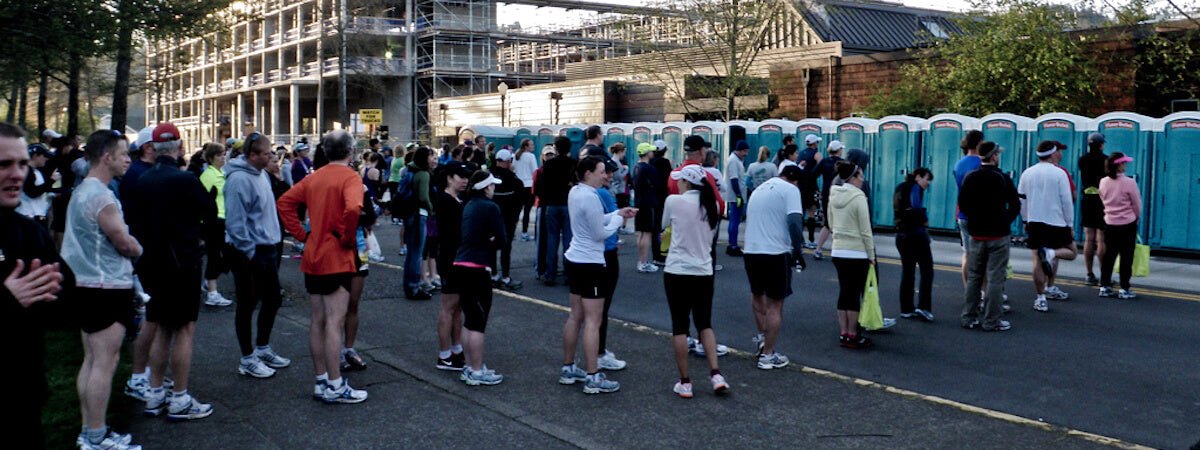 portable toilets queues racing running