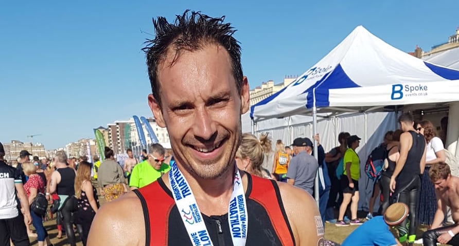 triathlete race medal finisher