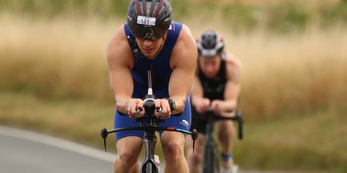 triathlete racing bike cycling