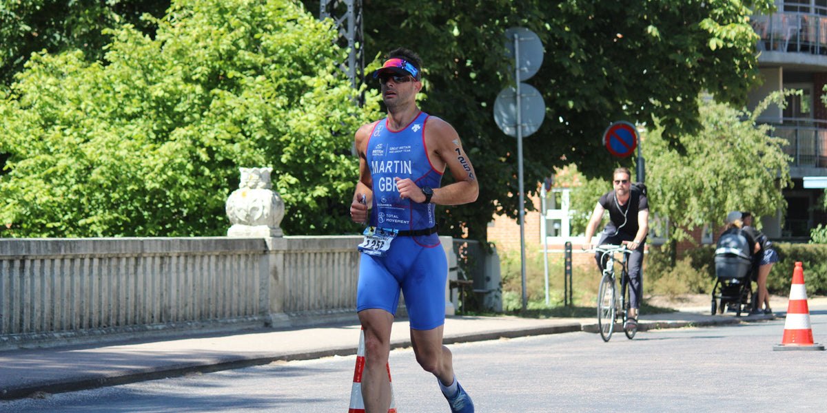triathlete running racing trisuit