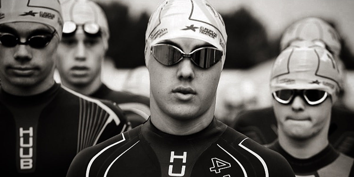 swimming wetsuit goggles swim cap triathlon