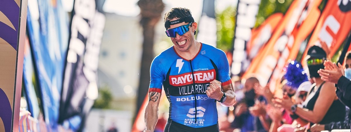 triathlon finish line winner athlete