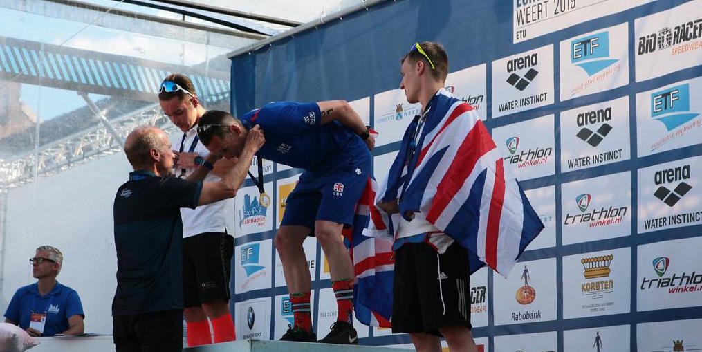 Sundried ambassador Will Grace ETU Triathlon Championships Podium WInner